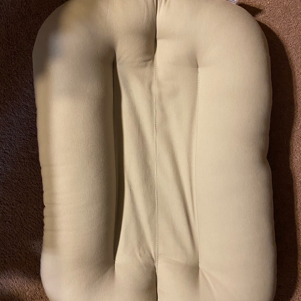 Infant snuggle me sleeper.